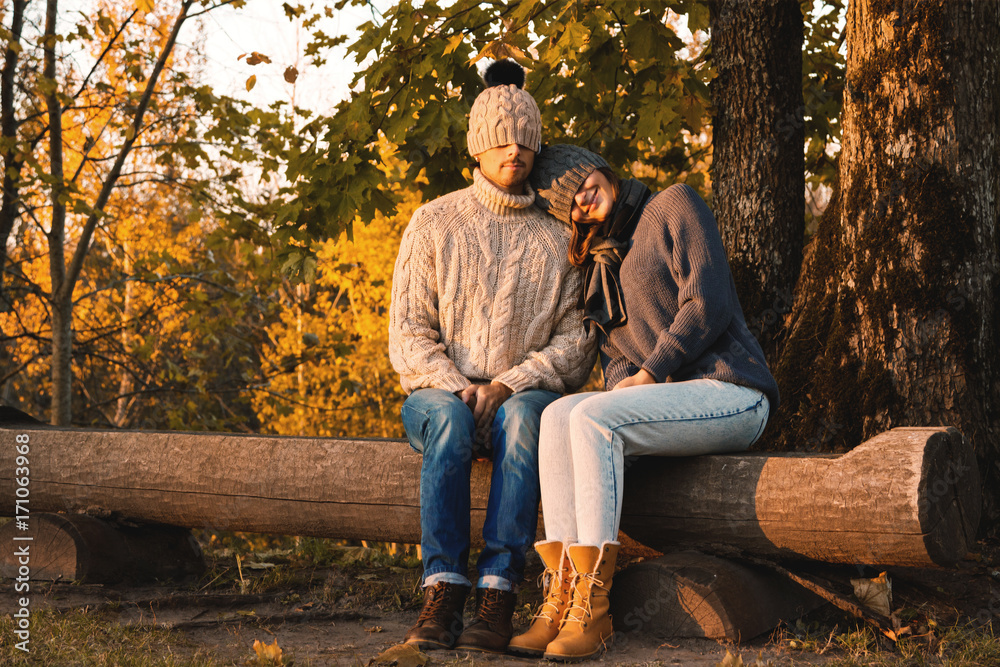 Young and happy couple in the autumn park Young and happy couple in the autumn park