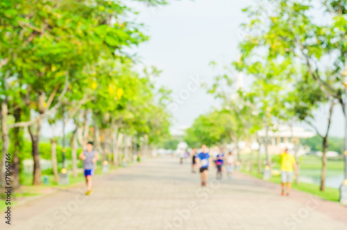 blur runner exercise with running or jogging on the morning in the park for healthy.