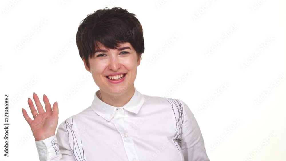 Caucasian pretty woman giving hand kiss isolated over white background in slow motion. Concept of emotions Caucasian pretty woman giving hand kiss isolated over white background in slow motion. Concept of emotions