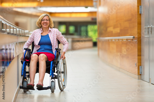 young woman on wheelchair in the medical center