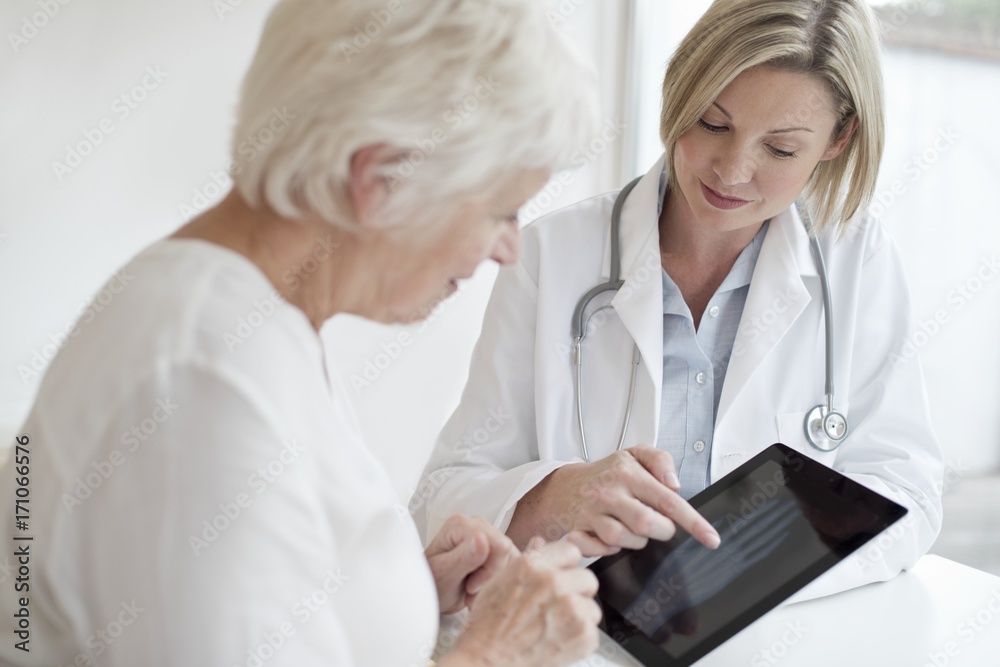 Female doctor with digital tablet Female doctor with digital tablet