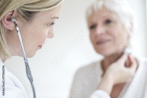 Wallpaper Mural Female doctor wearing stethoscope Torontodigital.ca