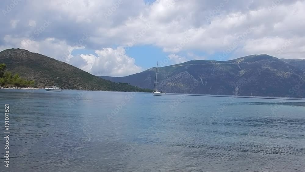 The bay of Skinos with green and turquoise sea in Ithaka or Ithaca island in Greece. Speedy version. The bay of Skinos with green and turquoise sea in Ithaka or Ithaca island in Greece. Speedy version.