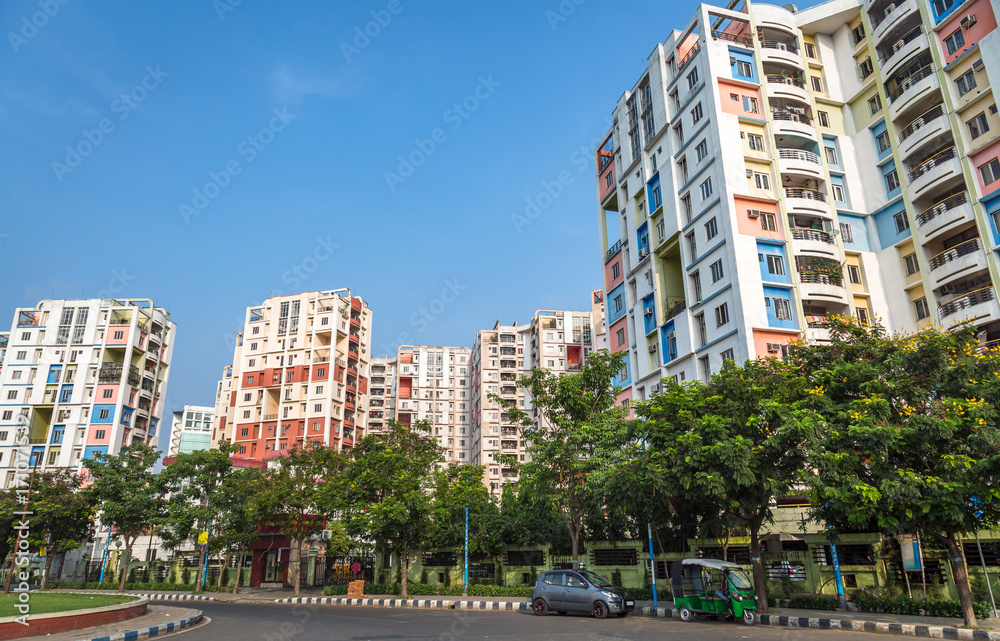 Fototapeta premium High rise colorful city residential buildings with city road at Kolkata, India.