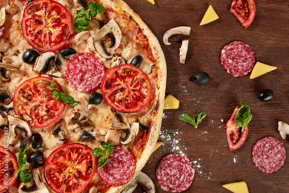 delicious italian pizza served on wooden table delicious italian pizza served on wooden table