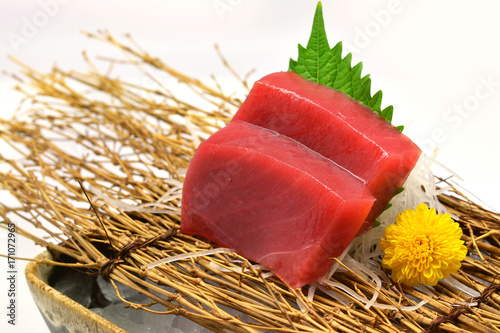 Close-up chutoro (Tuna) sashimi in brown bowl Japanese style on white background