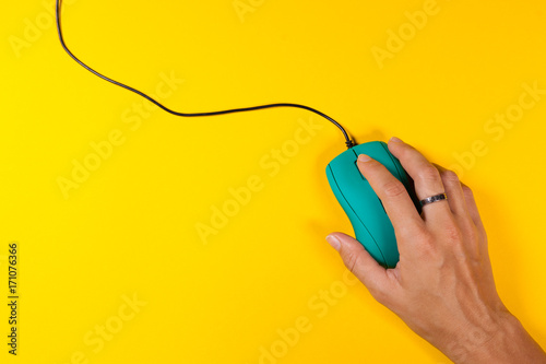 Woman's hand on a computer mouse 