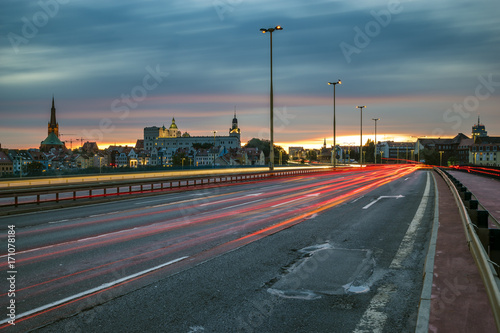 The road leading to Szczecin after sunset  traces of lights of cars