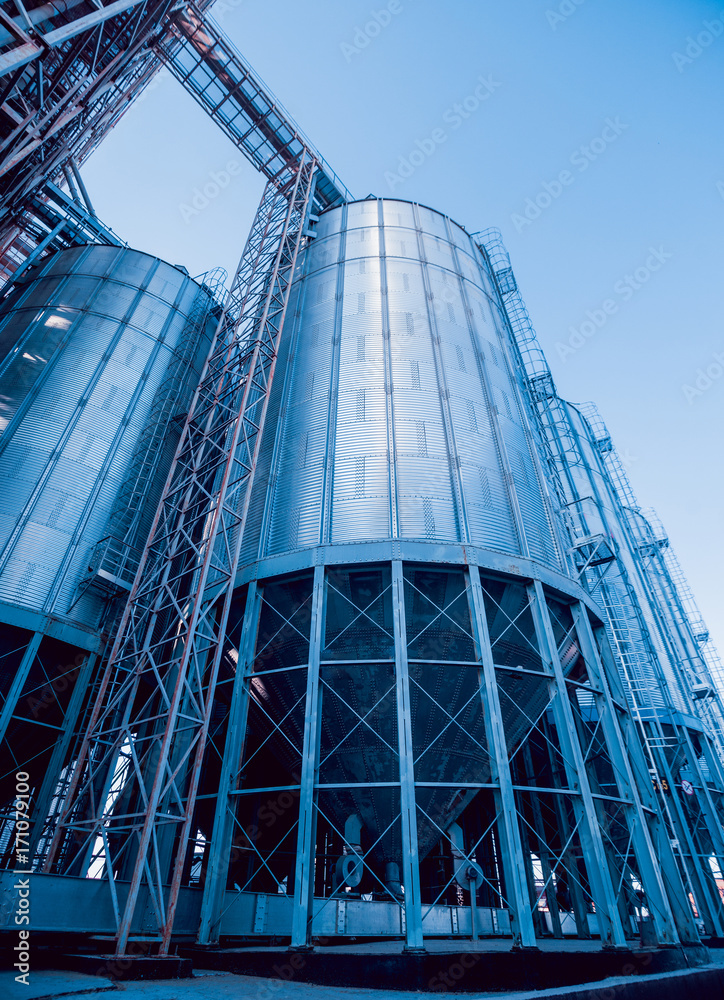 Modern silos for storing grain harvest. Agriculture. Modern silos for storing grain harvest. Agriculture.
