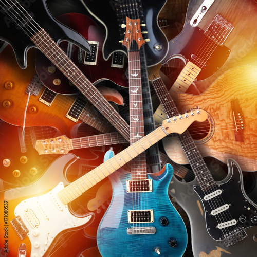 Slika na platnu Set of electric guitars laying on each other