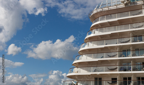 Cruise liner closeup on blue sky background.