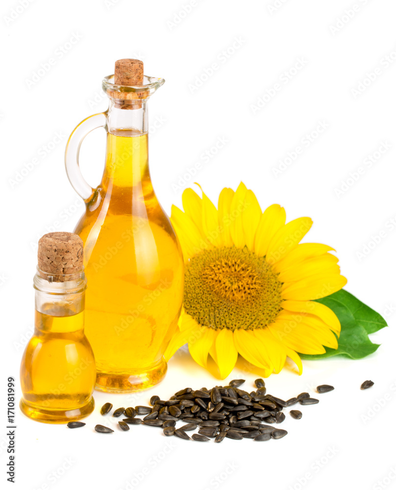 Sunflower oil, seeds and flower isolated on white background Sunflower oil, seeds and flower isolated on white background