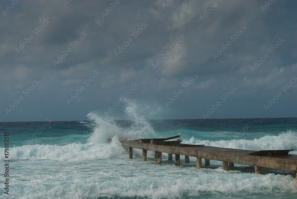 Hurricane Irma as she passes through the Caribbean. This shot was taken from the coastline of Grand Cayman where the stormy conditions created a violent ocean. 