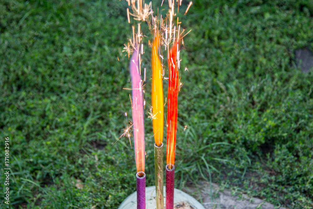 multi-colored fireworks candles