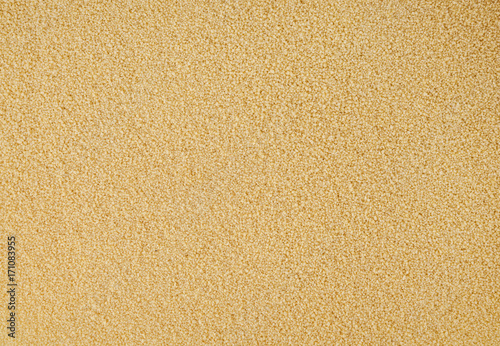 Uncooked couscous background