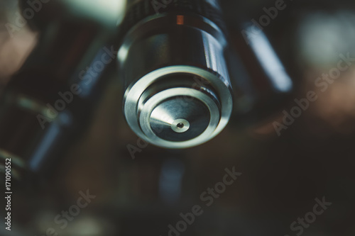 Laboratory Equipment - Optical Microscope. Microscope is used for conducting planned, research experiments, educational demonstrations in medical and health institutions, laboratories. Close up photo. © freedarts