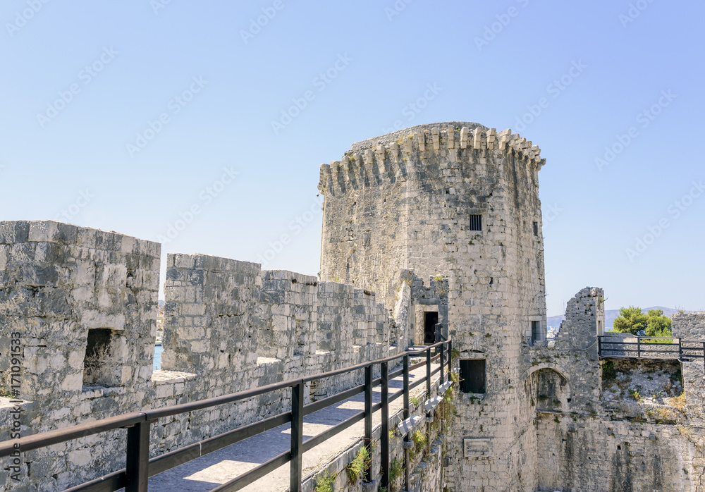 The walls of the old stone fortress.