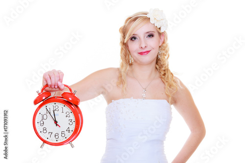Woman bride holding big red clock