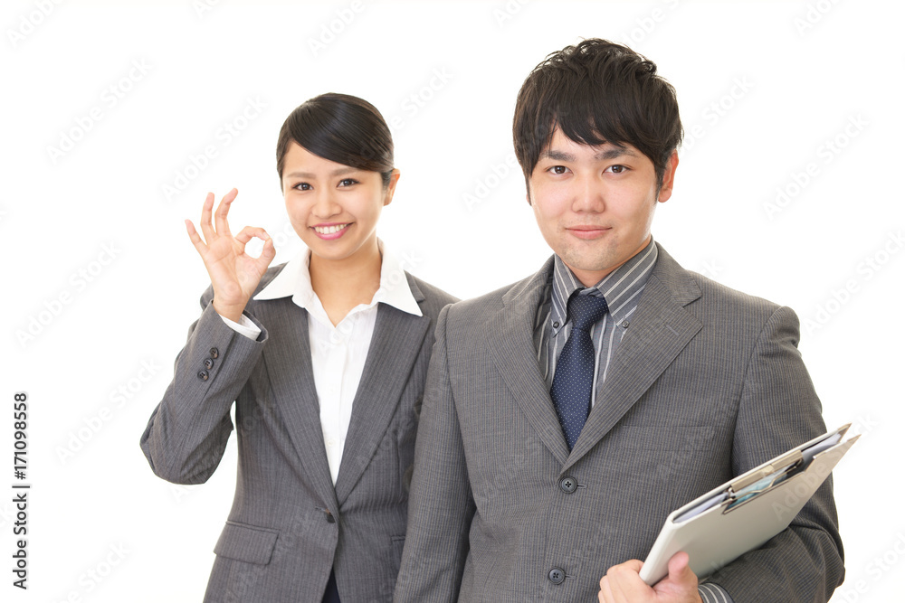 笑顔のビジネスマンとOL