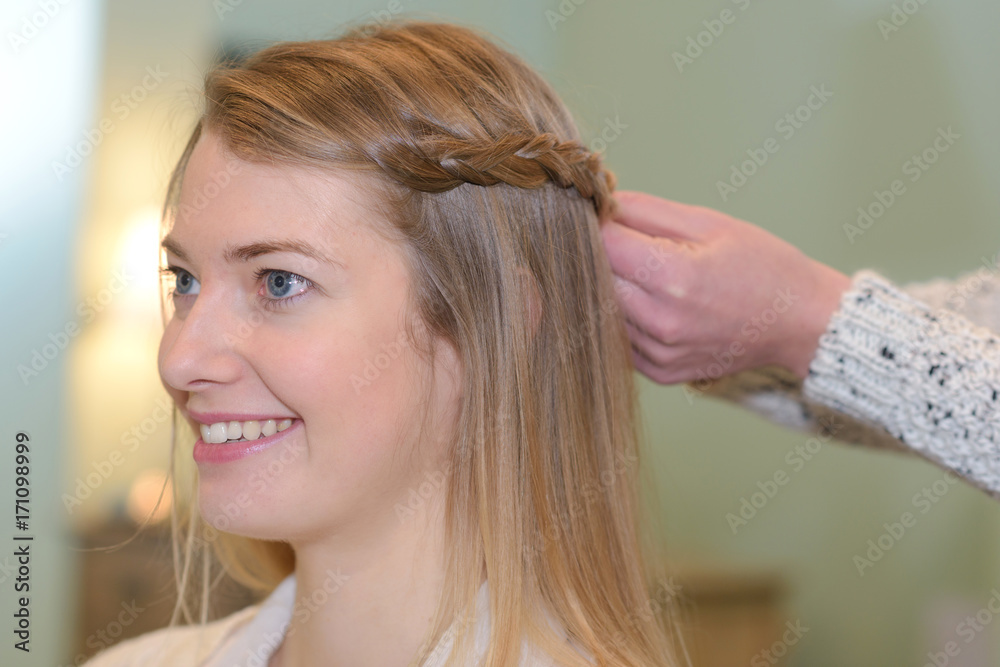 Naklejka premium woman getting hairdo