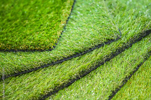 Green artificial turf. Probes examples of artificial turf, floor coverings for playgrounds. photo