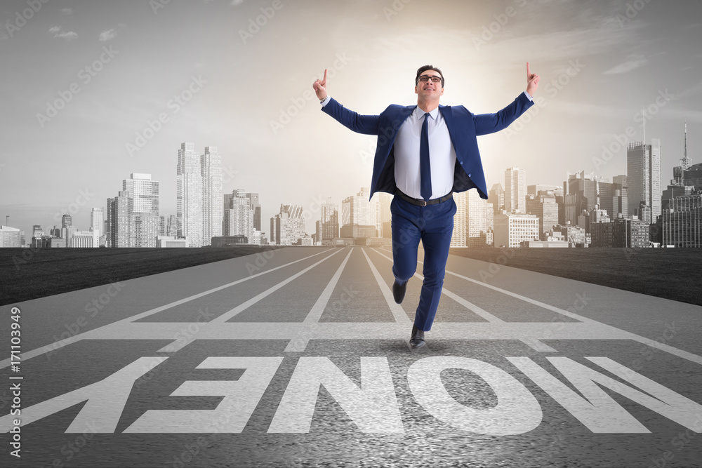 Young businessman chasing money in financial business concept