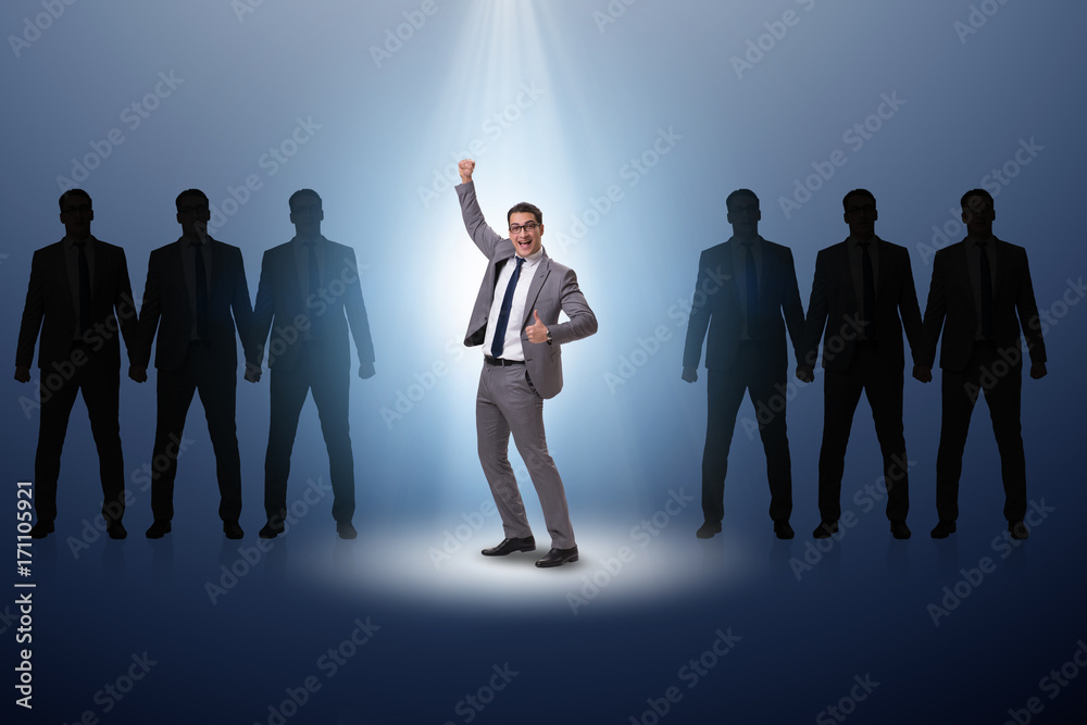 Businessman in the spotlight in business concept