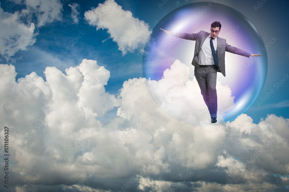 Businessman flying inside the bubble Businessman flying inside the bubble