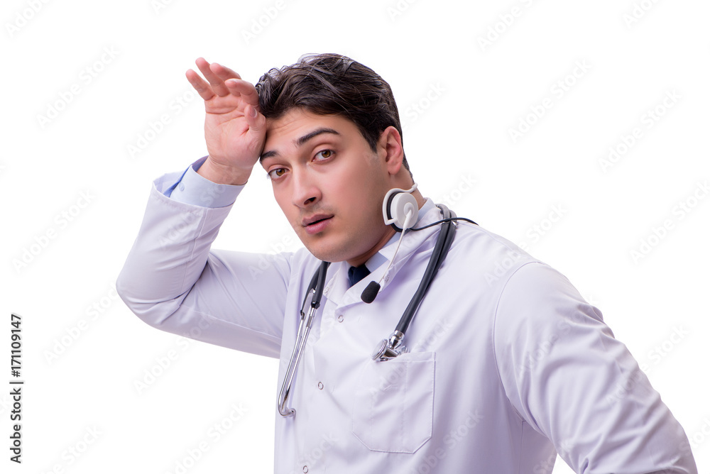 Young doctor with phone headset isolated on white Young doctor with phone headset isolated on white