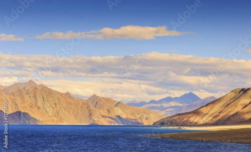 Pangong tso (Lake). It is huge lake in Ladakh, altitude 4,350 m (14,270 ft). It is 134 km (83 mi) long and extends from India to Tibet. Leh, Ladakh, Jammu and Kashmir, India. © farizun amrod