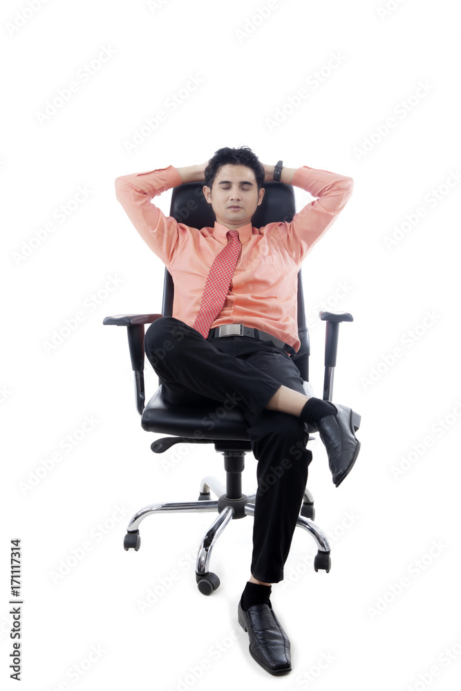 Young businessman sleeping on the chair Young businessman sleeping on the chair