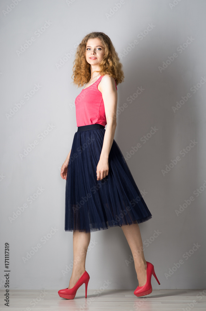 Young beautiful woman in pink shoes Young beautiful woman in pink shoes
