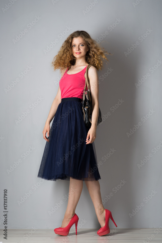 Young beautiful woman in pink shoes Young beautiful woman in pink shoes