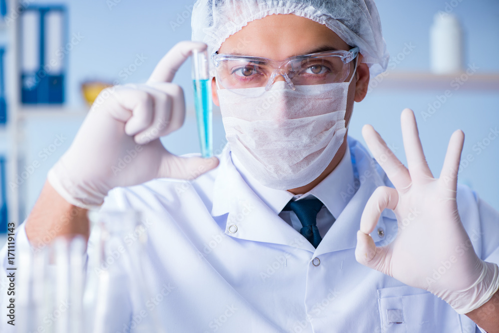 Female scientist researcher conducting an experiment in a labora Female scientist researcher conducting an experiment in a labora