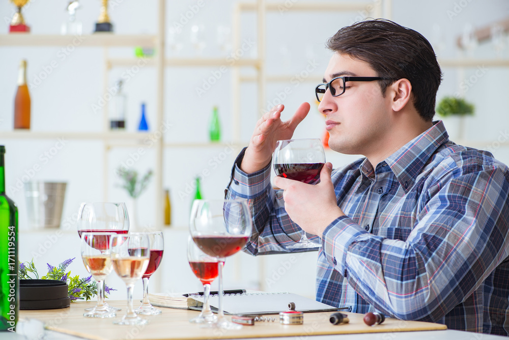 Professional sommelier tasting red wine Professional sommelier tasting red wine