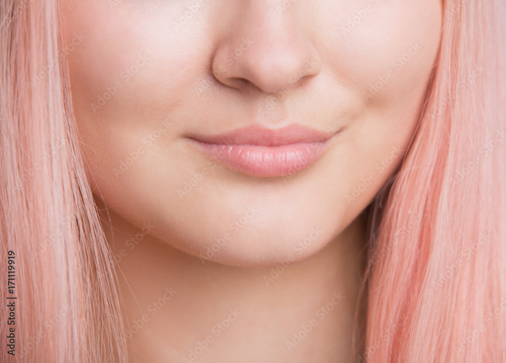 Closeup of female lips. Slightly smiling. No makeup Closeup of female lips. Slightly smiling. No makeup