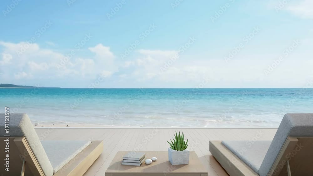 Sea view terrace and beds in modern luxury beach house with blue sky background, Lounge chairs on wooden deck at vacation home or hotel - 3d rendering of tourist resort
