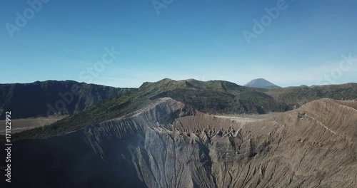Mountain Bromo active volcano crater in East Jawa, Indonesia. Top view from drone fly. 4K footage photo