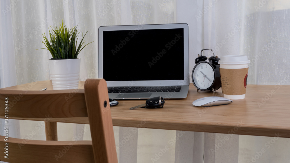 Laptop with smart phone notebook and coffee cup on workplace table. Laptop with smart phone notebook and coffee cup on workplace table.