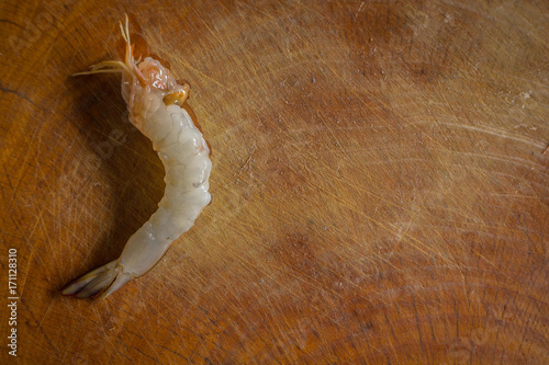 The Fresh shrimp cooking on wood plate top view