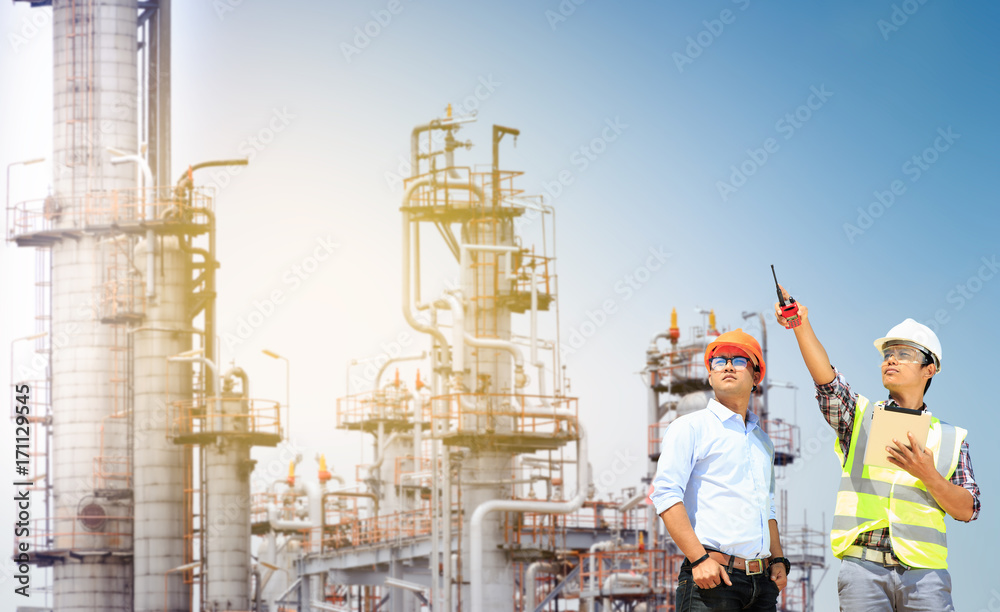 Engineers working in refineries. Engineers working in refineries.