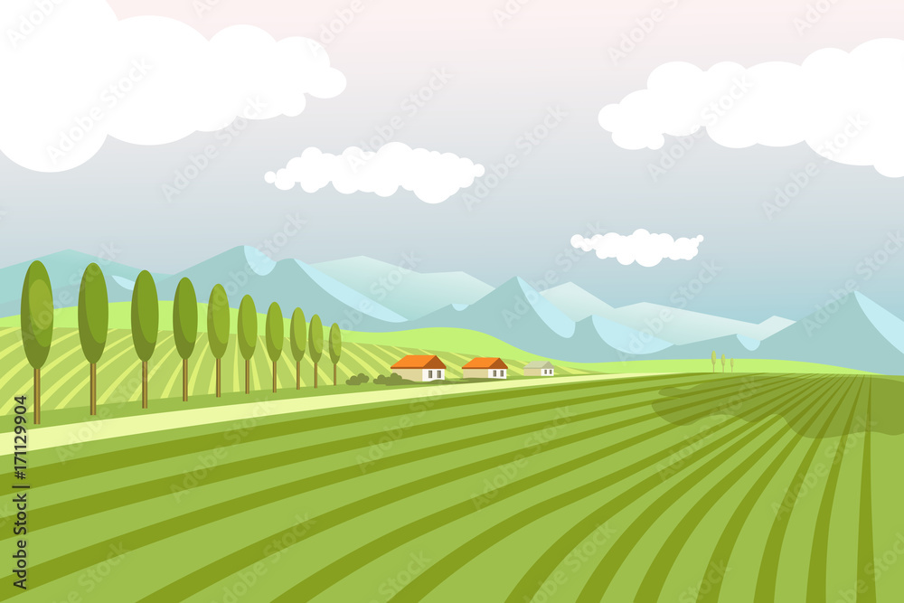 Fototapeta premium Natural landscape with wide plowed fields and high mountains