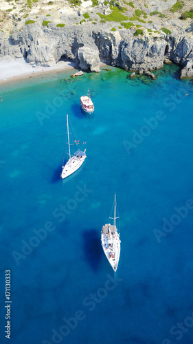 August 2017: Aerial drone photo of paradise beach of Traganou with small caves and turquoise clear waters, Rhodes island, Dodecanese, Aegean, Greece photo