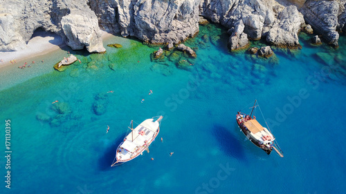 August 2017  Aerial drone photo of paradise beach of Traganou with small caves and turquoise clear waters  Rhodes island  Dodecanese  Aegean  Greece