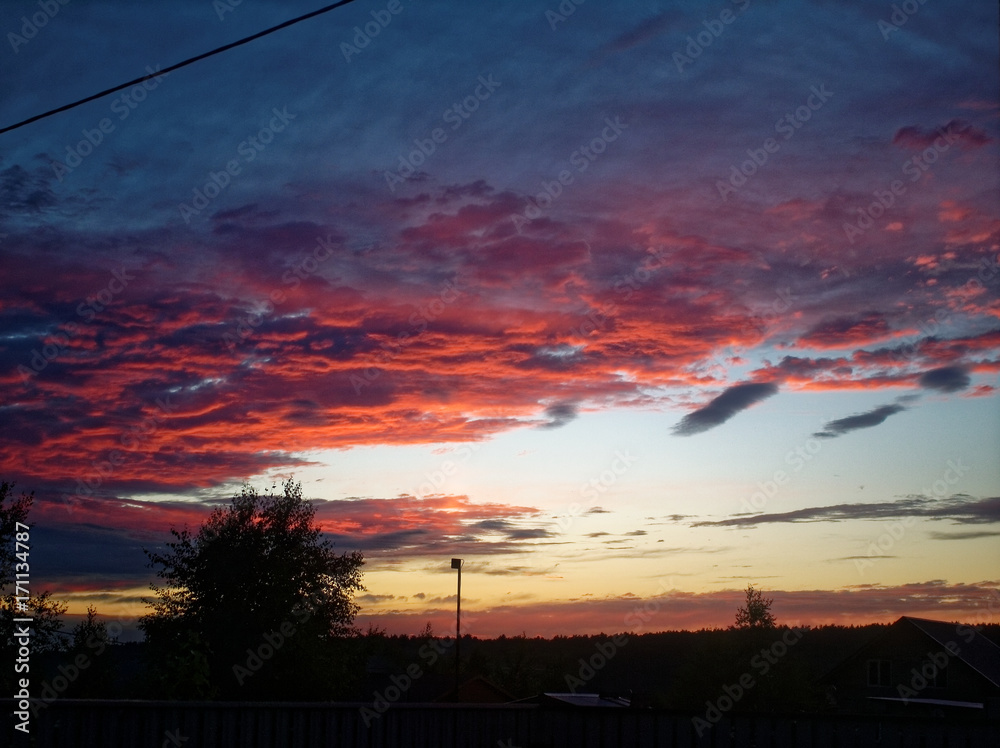 beautiful sunset in the summer in the village beautiful sunset in the summer in the village