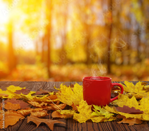 Autumn leaves and coffee.