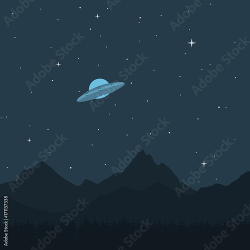 UFO. A spaceship in the background of a mountain
