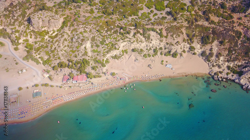 August 2017: Aerial drone photo of famous Tsabika monastery overlooking iconic Tsabika bay from the cliff with clear turquoise waters, Rhodes island, Aegean, Dodecanese, Greece photo