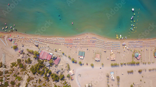 August 2017: Aerial drone photo of famous Tsabika monastery overlooking iconic Tsabika bay from the cliff with clear turquoise waters, Rhodes island, Aegean, Dodecanese, Greece photo
