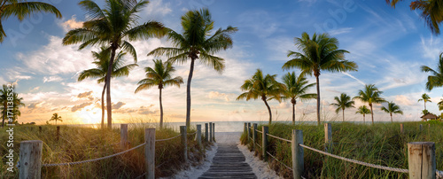 Panorama view of footbridge to the Smathers beach at sunrise - Key West, Florida. photo